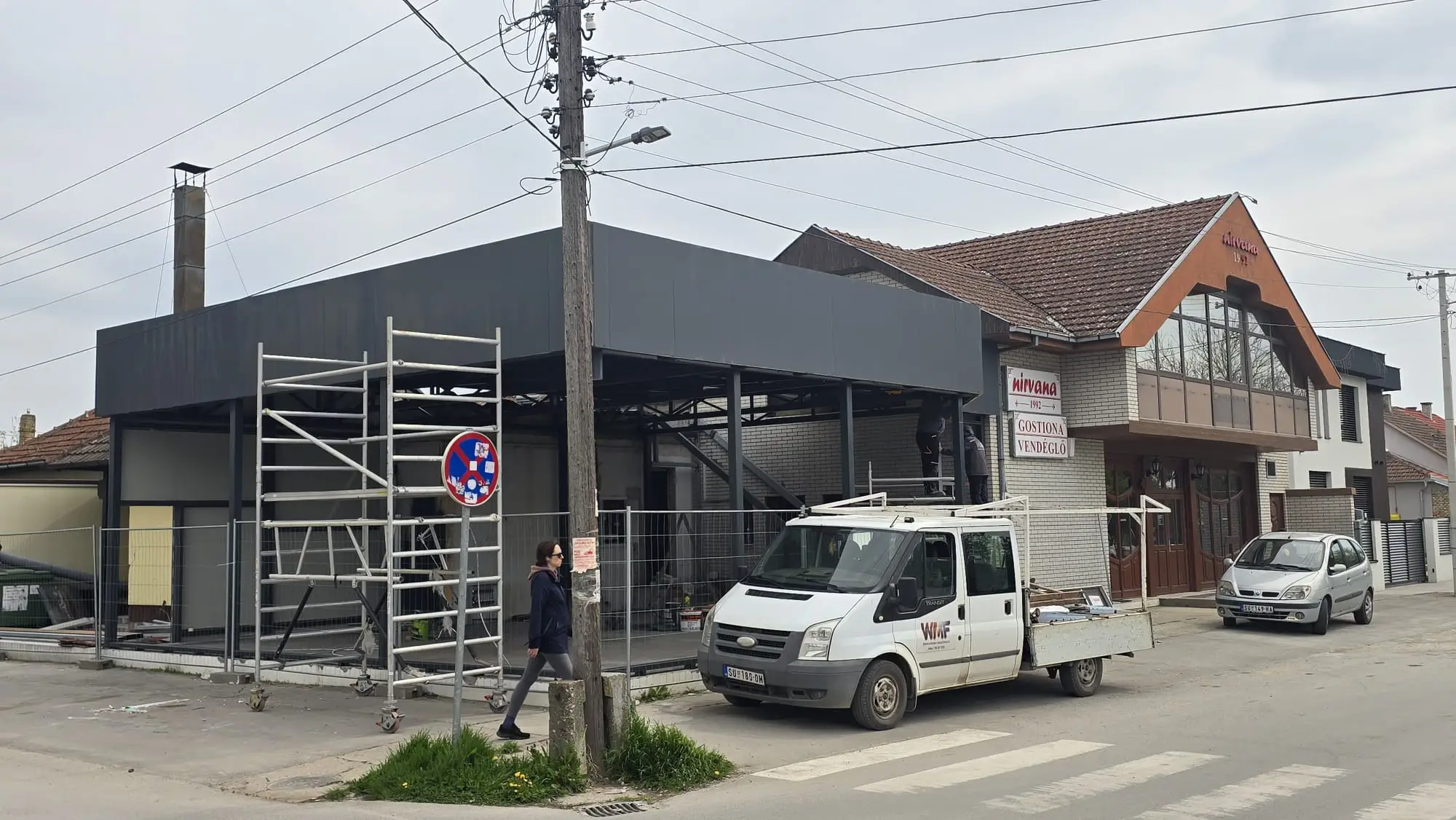 Steel canopy renovation on a restaurant building